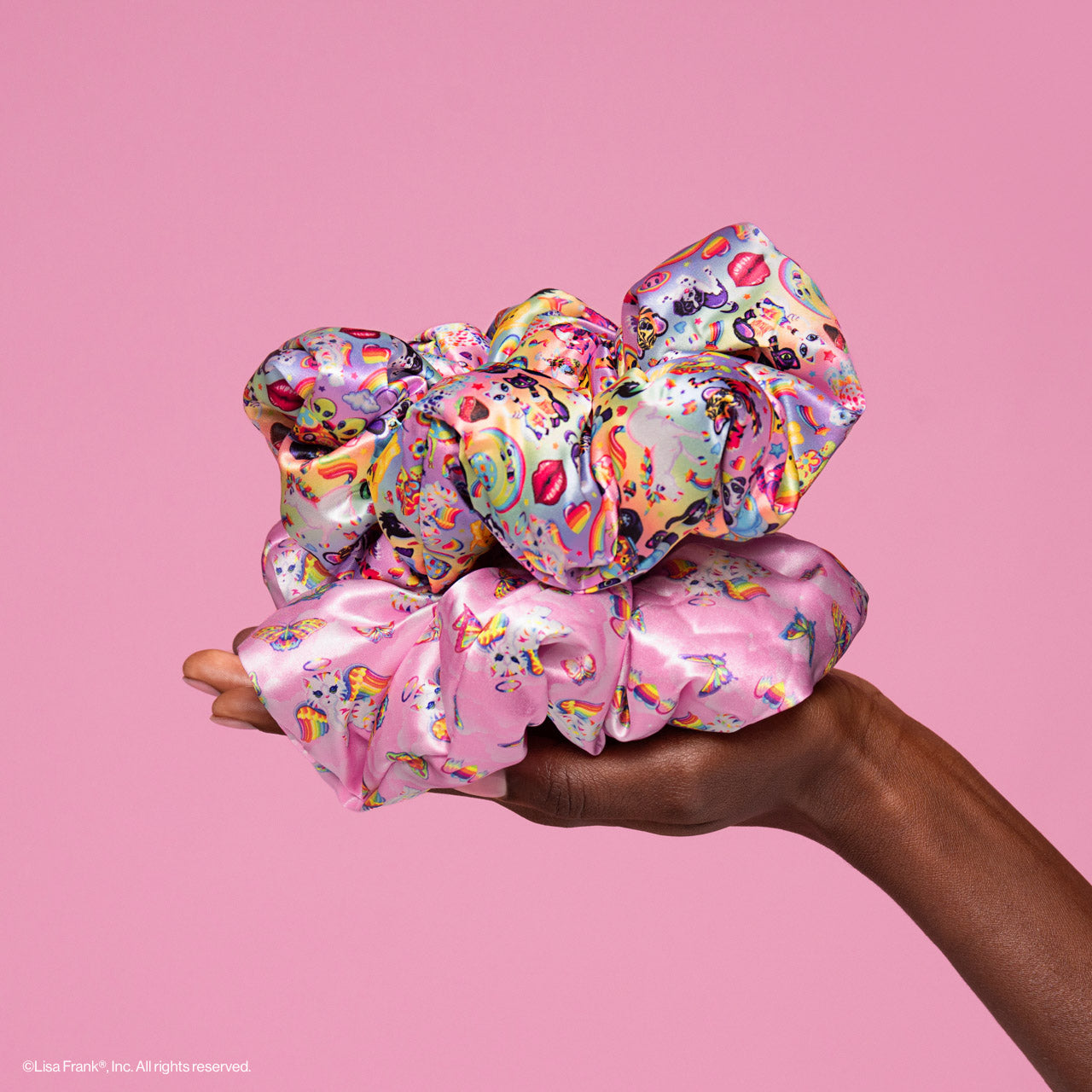 503509-LisaFrankxKitsch-SatinPillowScrunchies-2pc-TheFantasticWorldofLisaFrank-Model-1280x1280px-1.jpg